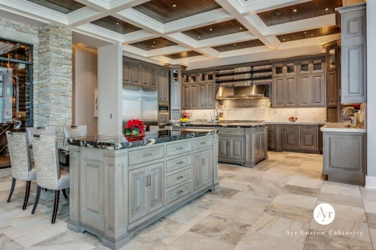 view of custom kitchen cabinets in Stevensville MI with island seating area and storage. Part of the complete Custom Cabinetry in Stevensville MI project