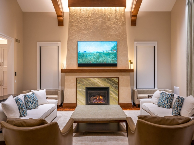 Wooden trusses on a vaulted ceiling in living room