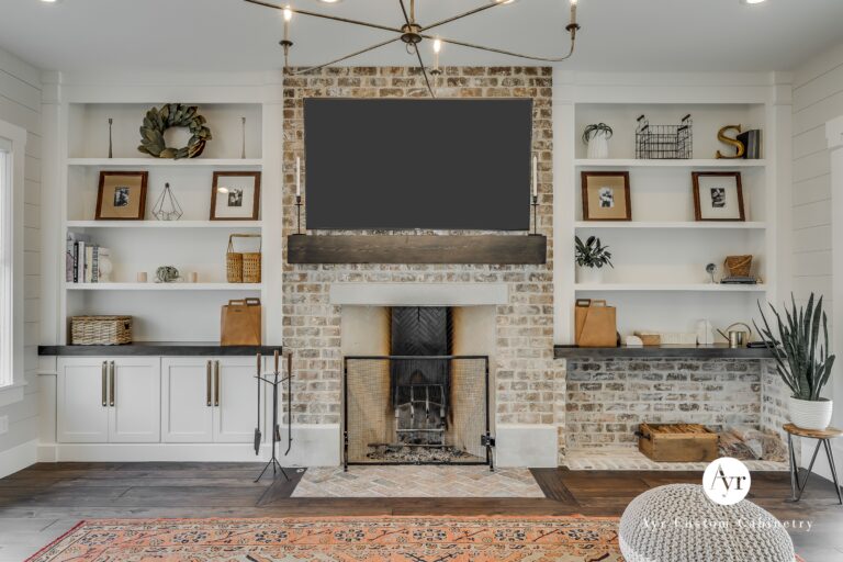 Custom shelves near entertainment center in white